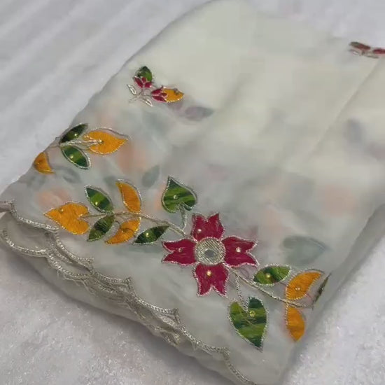 Studio product review video highlighting drape fluidity of five point five meter shining georgette saree - WishTown Fashion Club