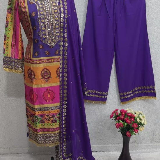 High definition retail display video highlighting the premium quality shine of sequence embroidery and the fluid movement of the printed purple georgette material.