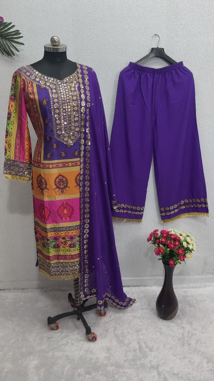High definition retail display video highlighting the premium quality shine of sequence embroidery and the fluid movement of the printed purple georgette material.