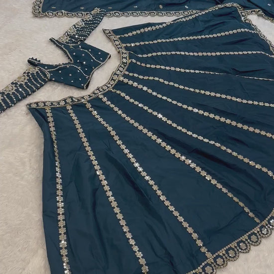 Teal blue Malai silk lehenga twirl video highlighting 3.5 meter flair - WishTown Fashion Club