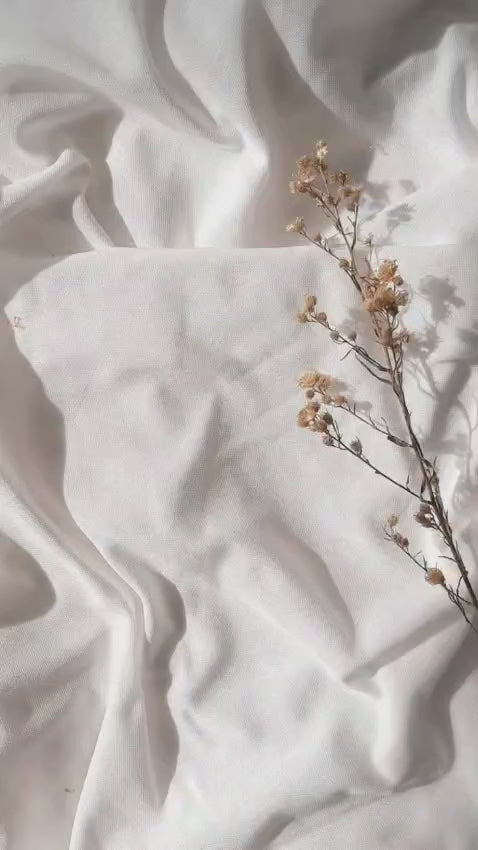 Studio product review video highlighting drape fluidity of five point five meter tissue silk saree - WishTown Fashion Club