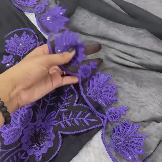 Showcase video displaying the natural fluid drape and detailed handcrafted chest sequence patterns of the purple silk traditional suit.
