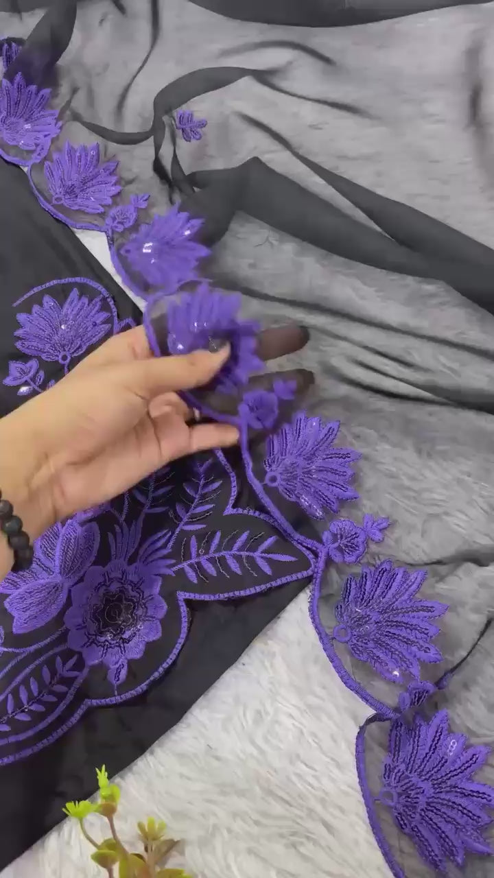 Showcase video displaying the natural fluid drape and detailed handcrafted chest sequence patterns of the purple silk traditional suit.