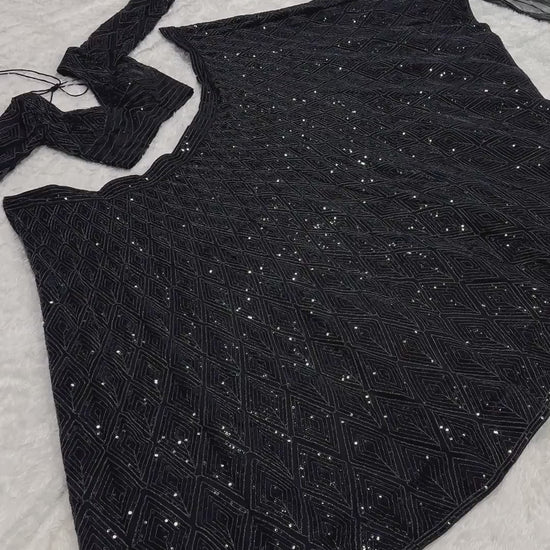 Black georgette lehenga set showcasing full flare and embroidery styling video - WishTown Fashion Club