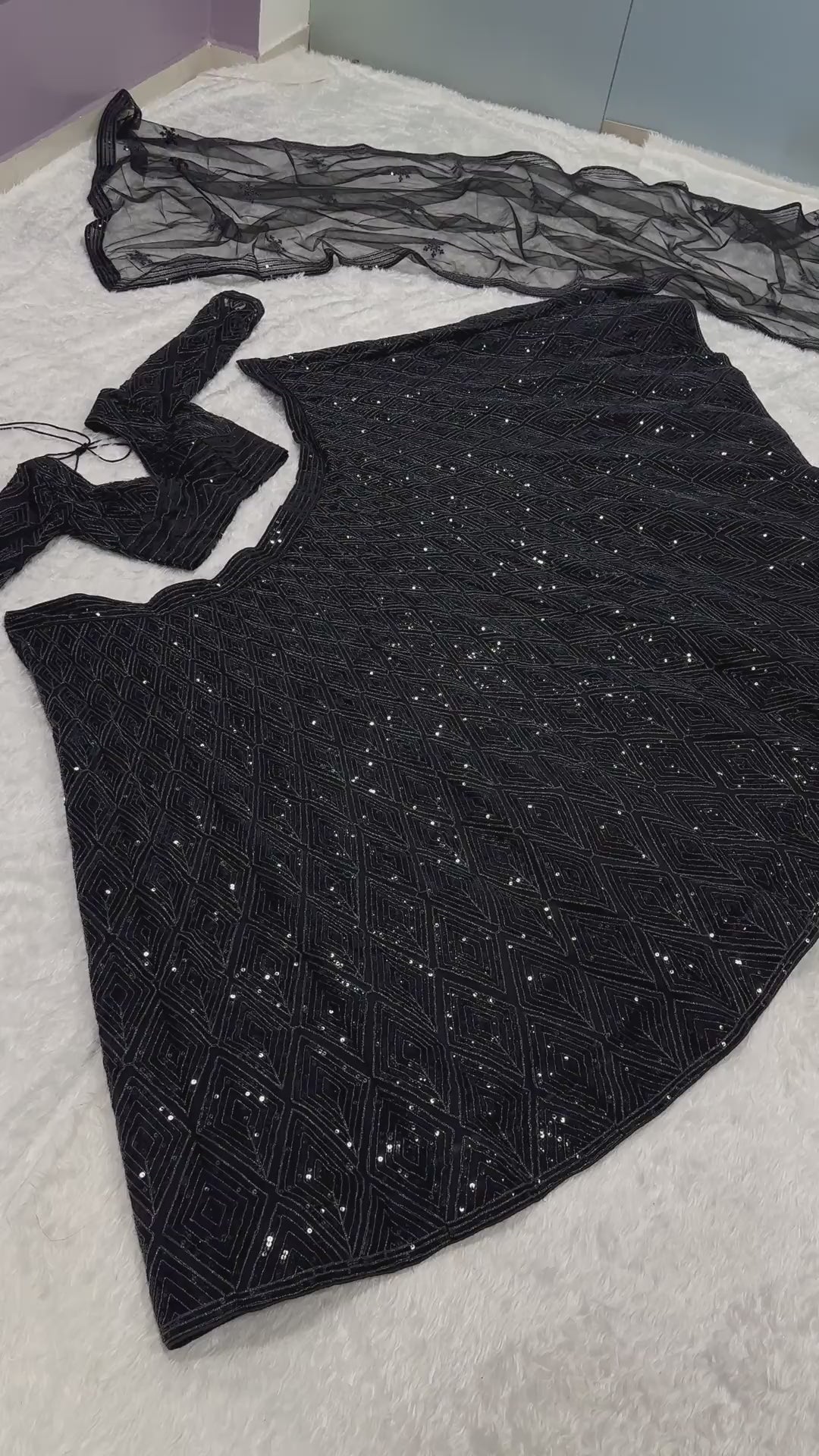 Black georgette lehenga set showcasing full flare and embroidery styling video - WishTown Fashion Club