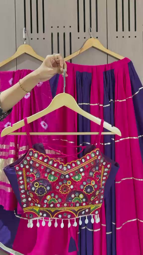 High definition retail showcase video displaying real mirror shine and six meter pleated flare twirl of dark pink lehenga - WishTown Fashion Club
