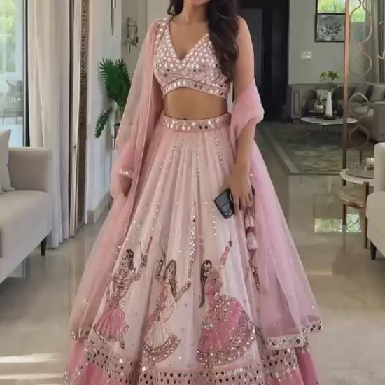 High definition retail showcase video displaying real mirror shine and four meter flare twirl of star georgette lehenga - WishTown Fashion Club