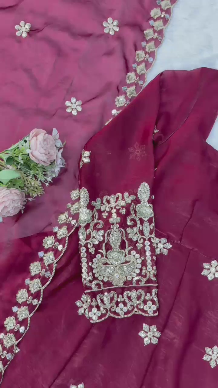 High definition retail display video highlighting the brilliant sparkle of mixed size sequins and the sweeping movement of the maroon anarkali skirt flare.