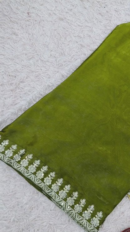 Green stylish party wear silk outfit featuring intricate embroidery, comfortable fit plazzo and matching dupatta – WishTown Fashion Club