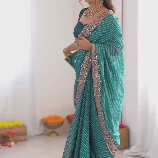 Studio product review video highlighting drape fluidity of five point five meter peacock blue georgette saree - WishTown Fashion Club