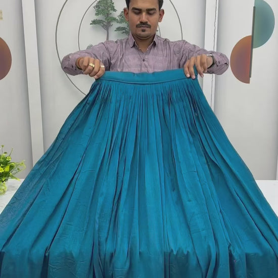 Studio product demonstration video showcasing the brilliant shine of sequence work and the grand movement of the three point five meter skirt flare during a slow turn.