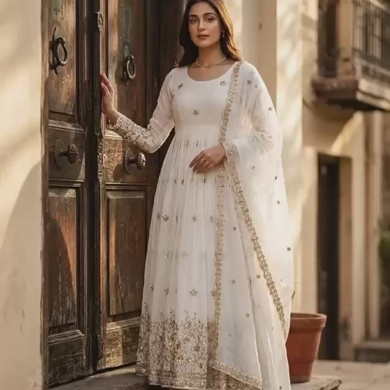 Off white designer gown with sequence work and matching dupatta festive wear video - WishTown Fashion Club