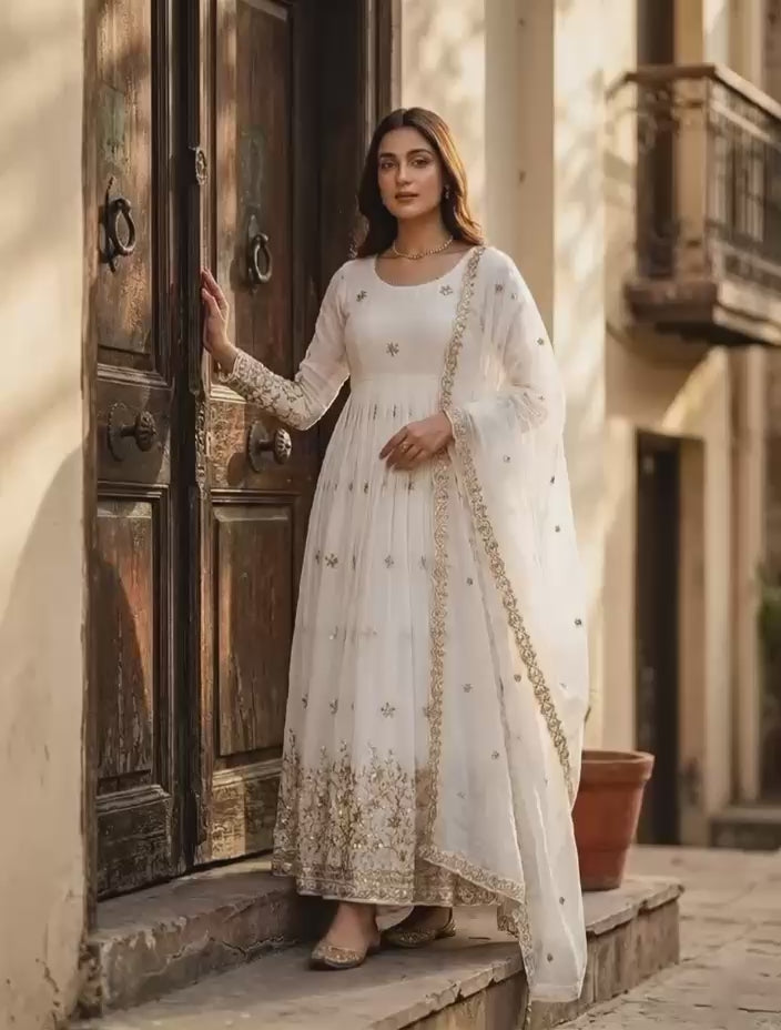 Off white designer gown with sequence work and matching dupatta festive wear video - WishTown Fashion Club