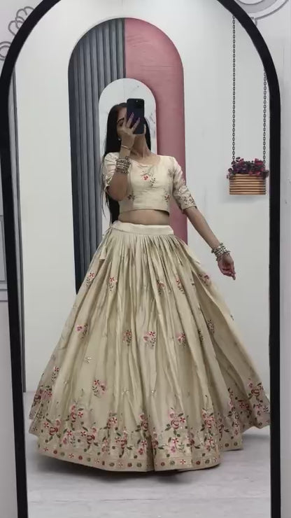 Slow motion product rotation video highlighting the sparkling sequence work and elegant movement of the cream skirt flare.