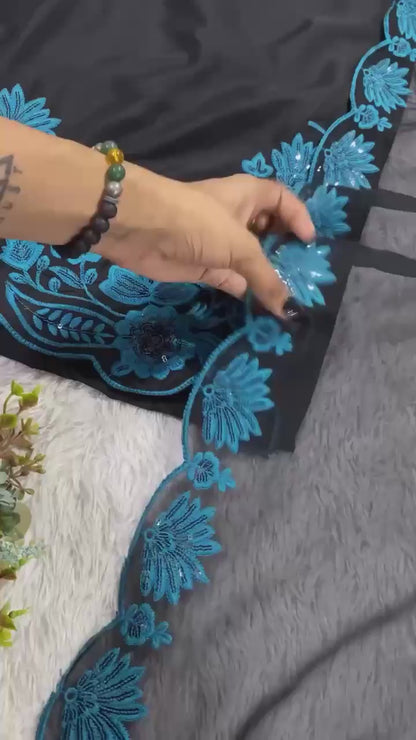 Studio product demonstration video highlighting the premium quality cloth surface and elegant flowing motion of the blue ethnic dress.