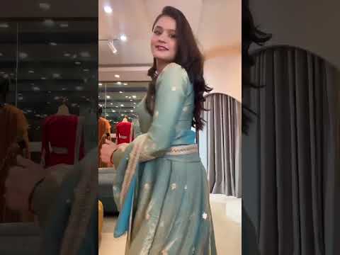 High definition retail showcase video displaying sequence work shimmer and full flair movement of sea green fendy silk gown - WishTown Fashion Club