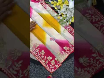 High definition retail showcase video displaying ribbon gota shine and shibori print vibrancy on white saree - WishTown Fashion Club